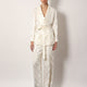Jacquard silk trousers with floral motif