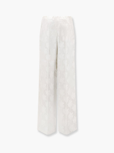 Jacquard silk trousers with floral motif