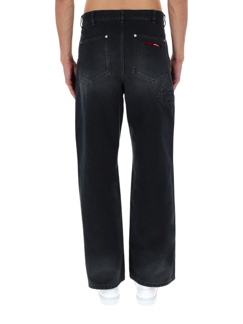 JEANS CON APPLICAZIONE LOGO