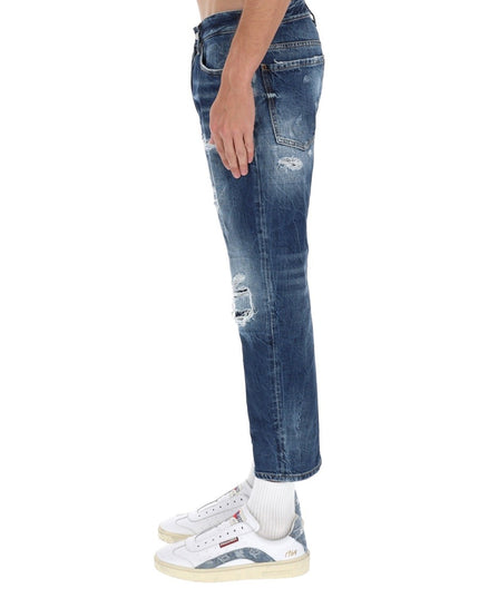 JEANS WITH "DESTROYED" DETAILS