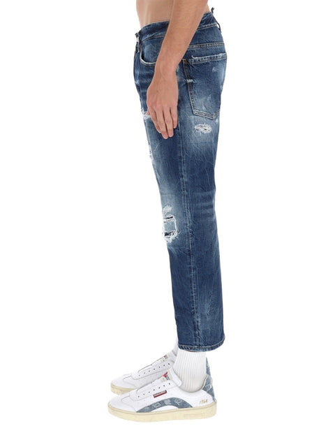 JEANS WITH "DESTROYED" DETAILS