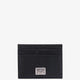 Leather card holder with metal logo tag