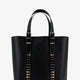 Leather shoulder bag with iconic studs