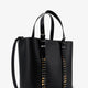 Leather shoulder bag with iconic studs