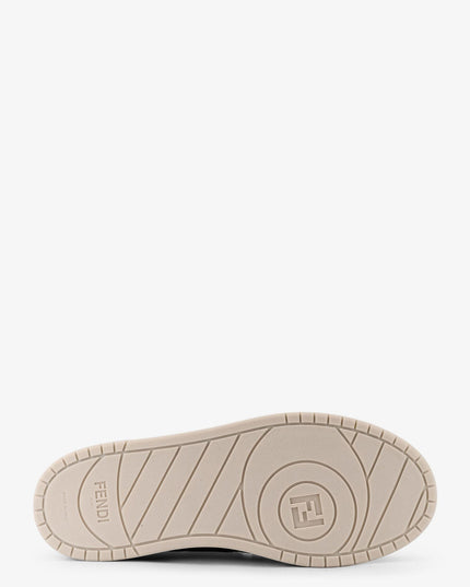 Match leather sneakers with suede inserts
