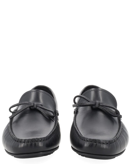 MOCCASIN WITH BOW