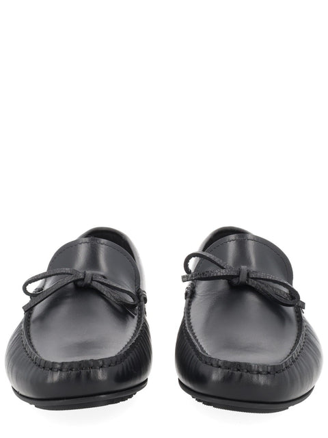 MOCCASIN WITH BOW