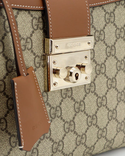 Padlock handbag with shoulder strap