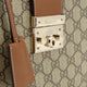 Padlock handbag with shoulder strap