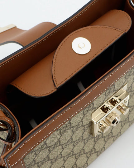 Padlock handbag with shoulder strap