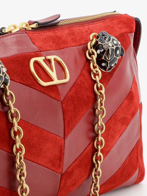 Panthea suede and leather crossbody bag