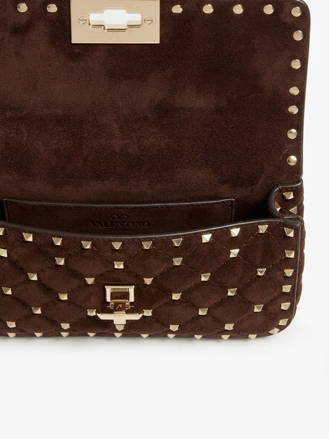 Rockstud Spike suede crossbody bag with all-over studs