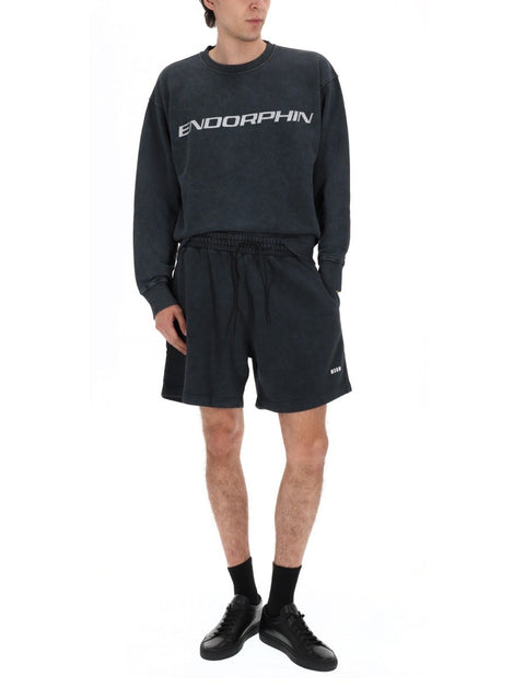 SHORTS CON LOGO