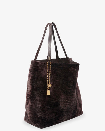 Spin shearling shoulder bag