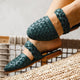 Sea Escape Geflochtene Leder-Slide-Sandalen