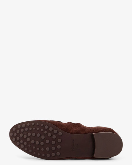 Suede loafer with metal logo detail