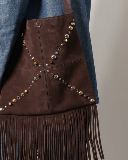 Suede shoulder bag with fringes and metal details