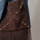 Suede shoulder bag with fringes and metal details