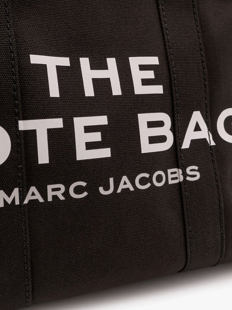 The medium tote canvas crossbody bag