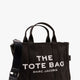The medium tote canvas crossbody bag