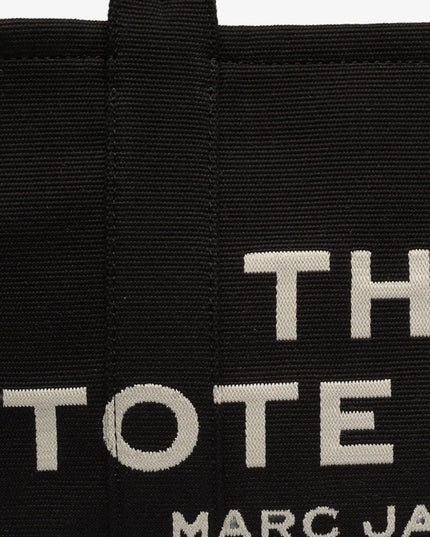 Traveler Tote canvas shopping bag with logo on the front