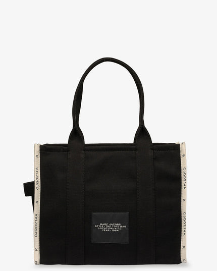 Traveler Tote canvas shopping bag with logo on the front